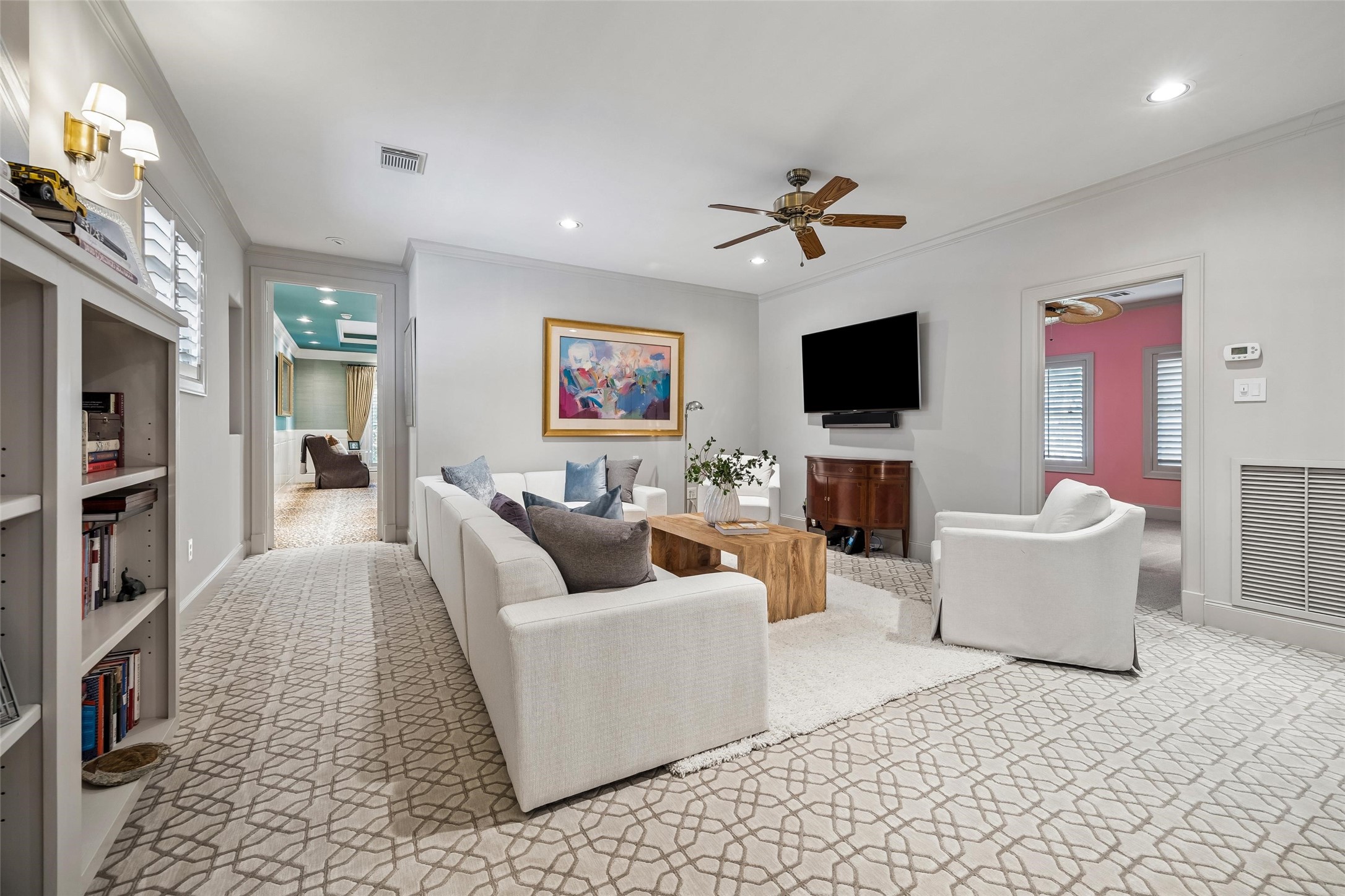 422 Pinewold Drive Houston, TX 77056 - Photo 26 of 49 a living room with furniture and a flat screen tv