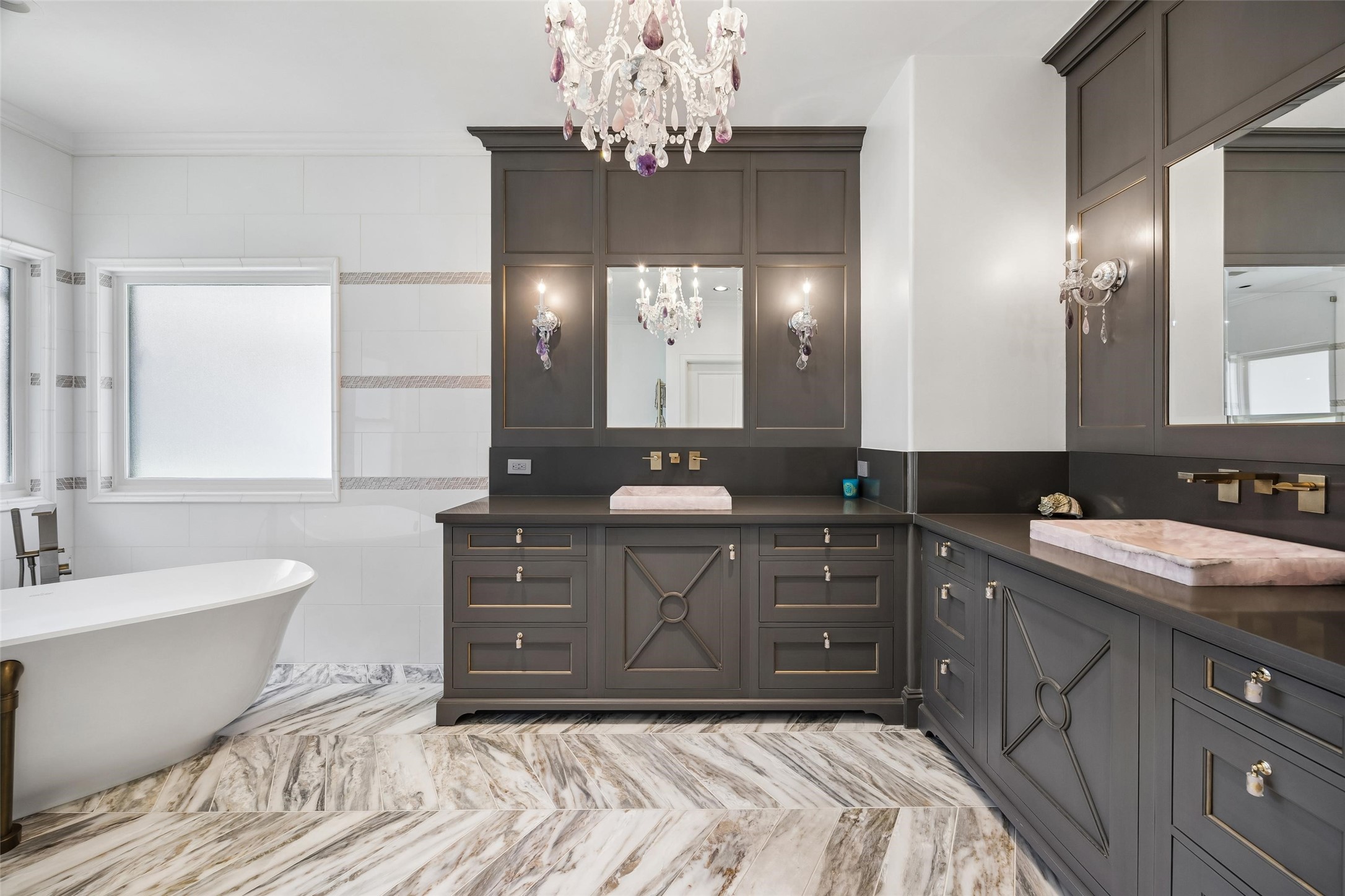 422 Pinewold Drive Houston, TX 77056 - Photo 28 of 49 a spacious bathroom with a double vanity sink large mirror and a bathtub