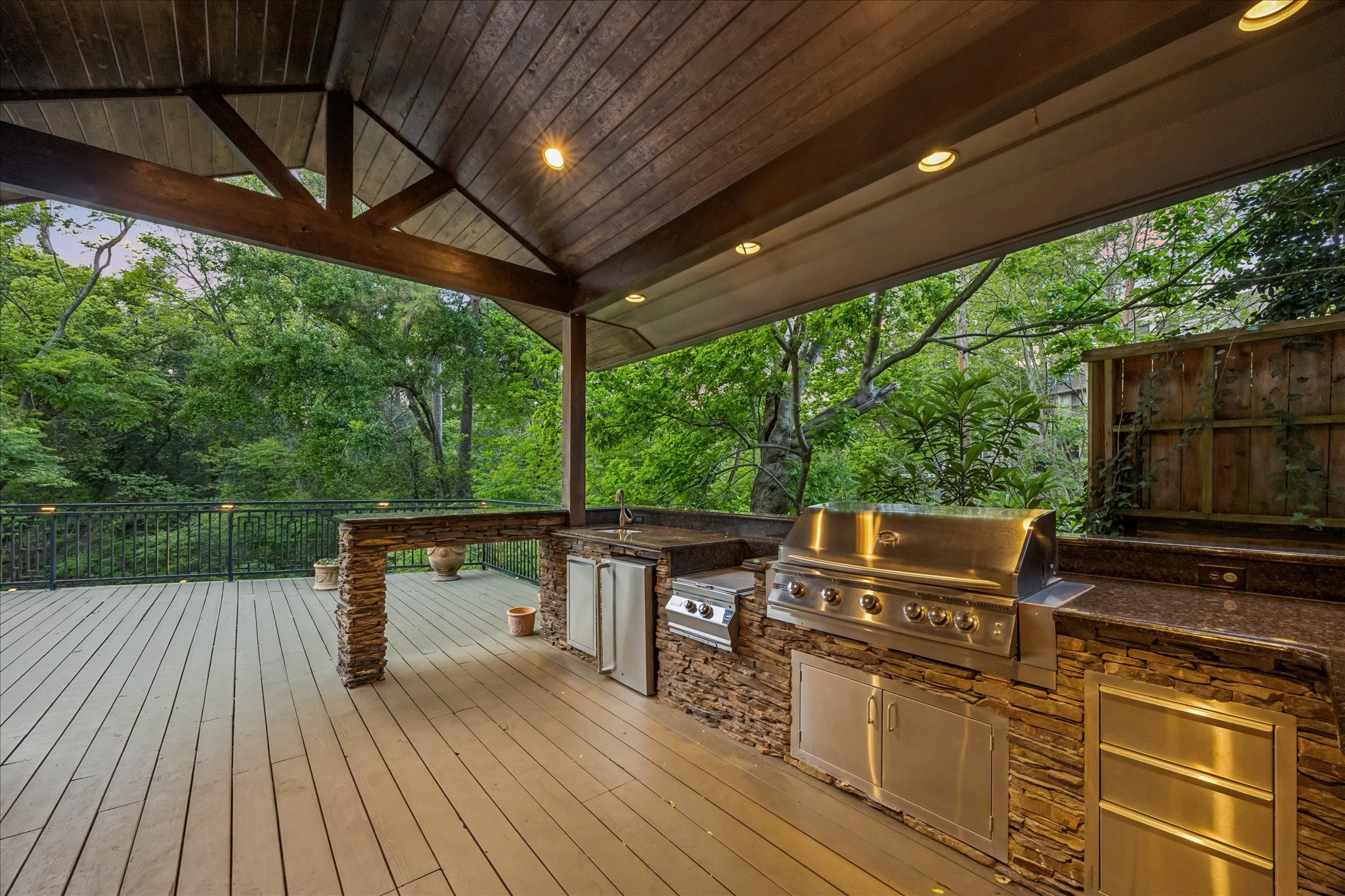 422 Pinewold Drive Houston, TX 77056 - Photo 37 of 49 The outdoor entertaining area is expertly lit for evening entertaining