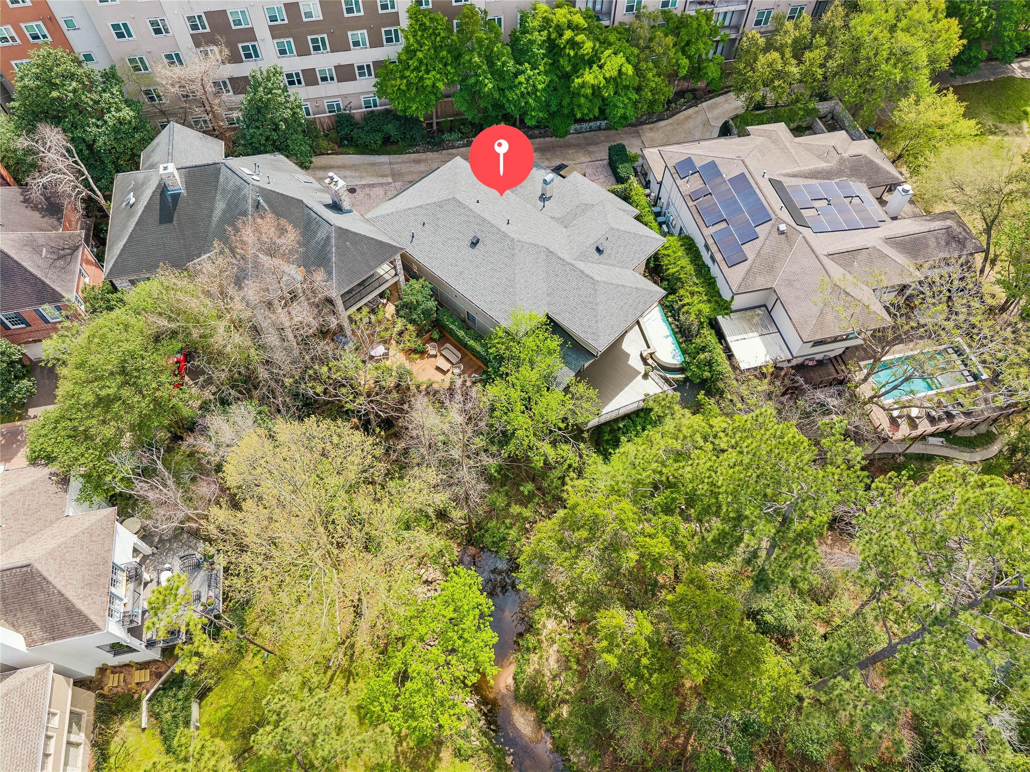 422 Pinewold Drive Houston, TX 77056 - Photo 49 of 49 an aerial view of a house with a yard and lake