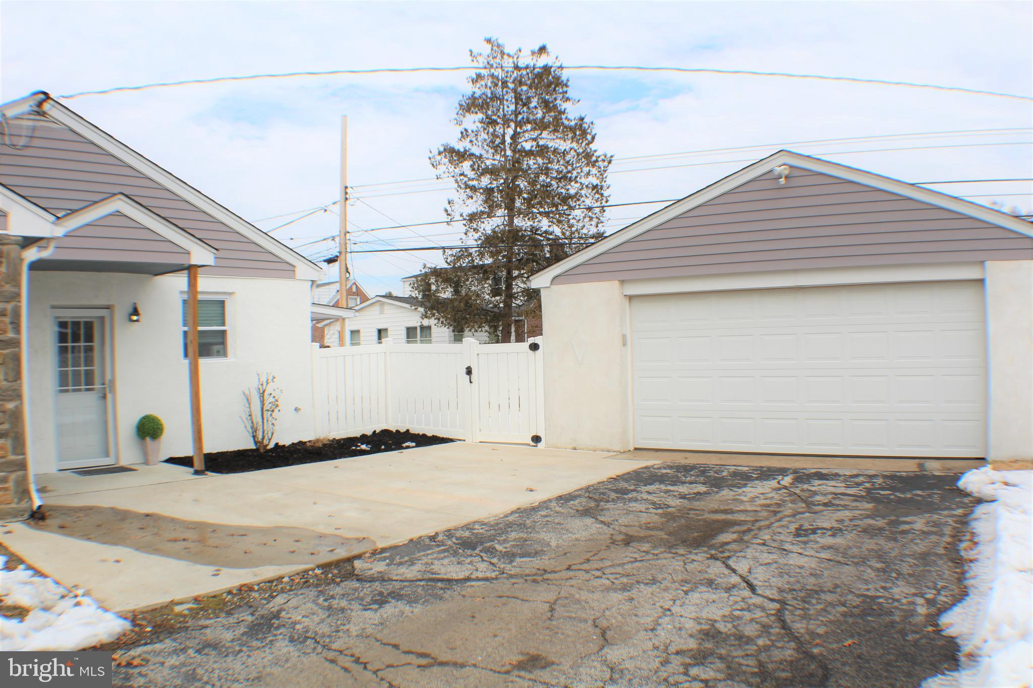 411 Michell Street Ridley Park, PA 19078 - Photo 3 of 28 Side Yard with 2-car Detached Garage