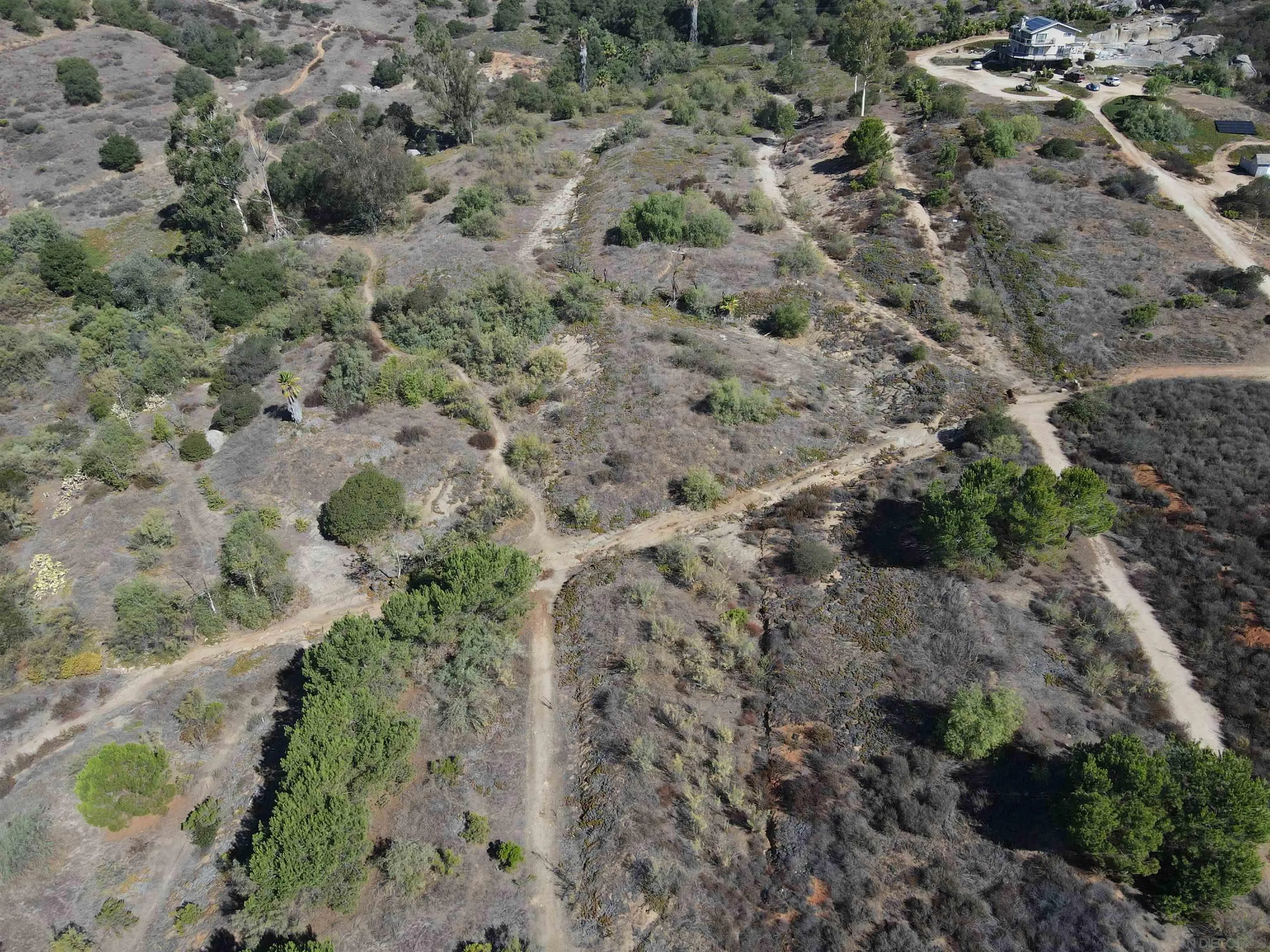 77.78-ac Jeffrey Heights Road Valley Center, CA 92082 - Photo 7 of 14 a view of a yard with a tree
