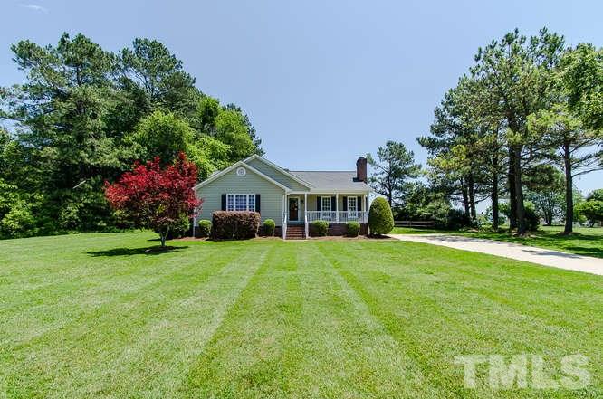 1912 Old Greenfield Road Raleigh, NC 27604 - Photo 2 of 25 a front view of a house with garden