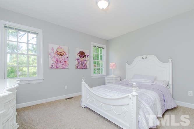 1912 Old Greenfield Road Raleigh, NC 27604 - Photo 15 of 25 a bedroom with a bed and a window