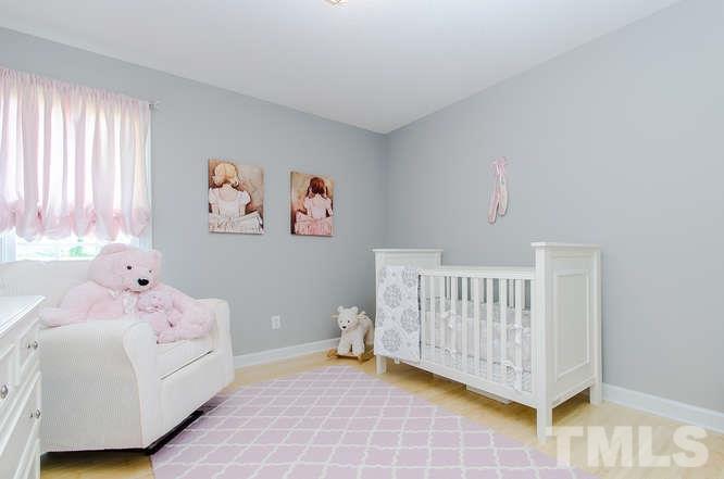 1912 Old Greenfield Road Raleigh, NC 27604 - Photo 16 of 25 a bedroom with a bed and a window