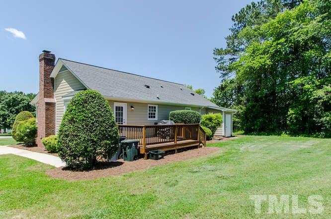 1912 Old Greenfield Road Raleigh, NC 27604 - Photo 20 of 25 a view of a house with a yard and sitting area