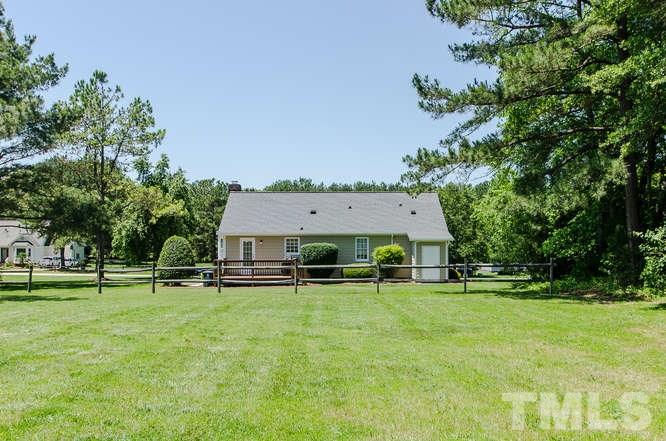 1912 Old Greenfield Road Raleigh, NC 27604 - Photo 22 of 25 a front view of a house with a yard