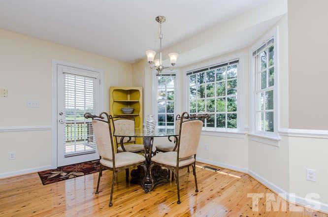 1912 Old Greenfield Road Raleigh, NC 27604 - Photo 7 of 25 a view of a dining room with furniture window and outside view
