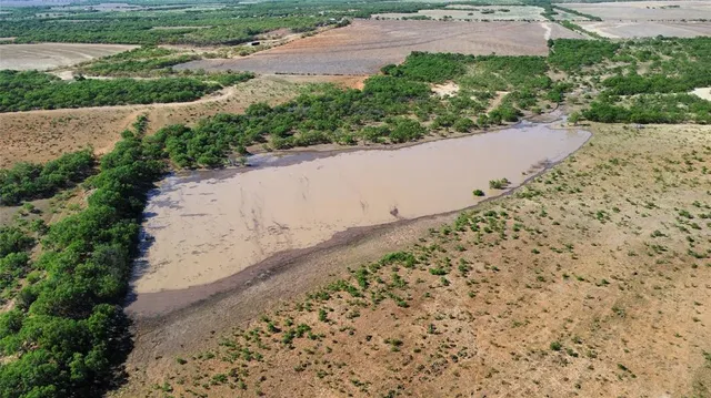 a view of a lake with a mountain in the background