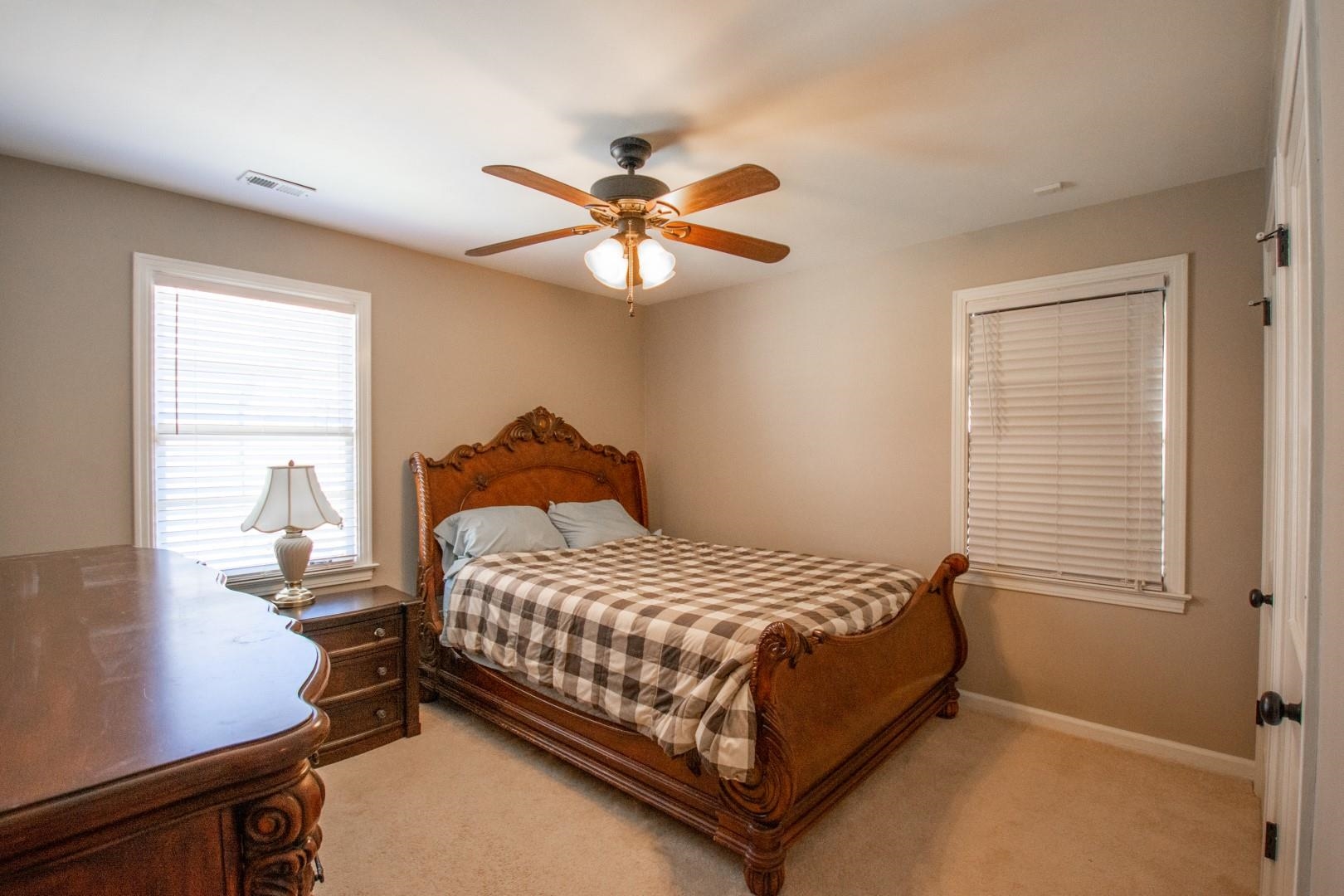 5006 New Castle Road Memphis, TN 38117 - Photo 14 of 20 a bedroom with a bed and a window