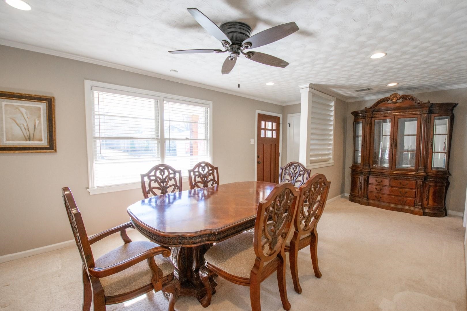 5006 New Castle Road Memphis, TN 38117 - Photo 9 of 20 a dining room with furniture and window
