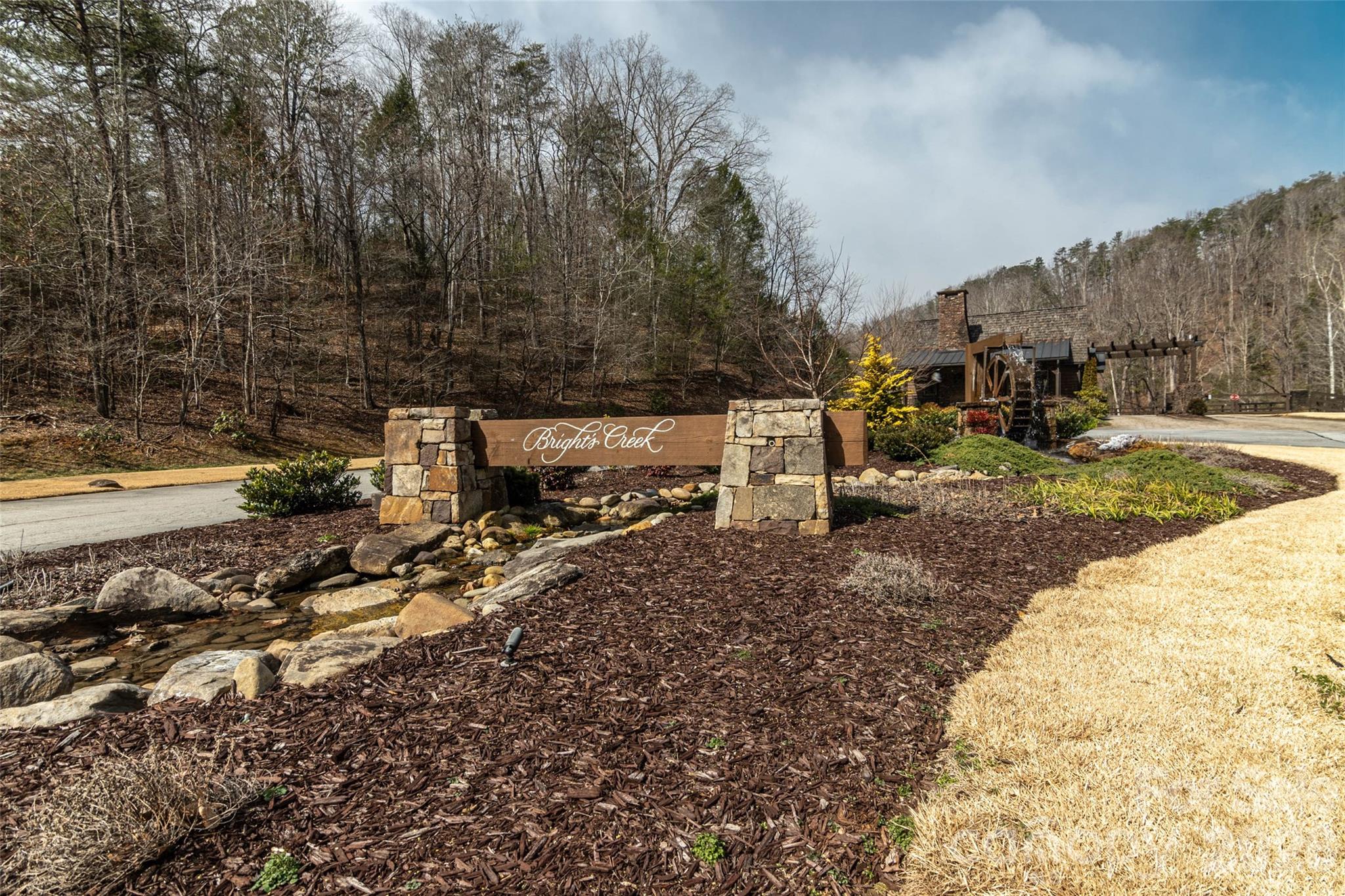 630 Spring Cove Ln Mill Spring Mill Spring, NC 28756 - Photo 24 of 39 a view of a backyard with trees