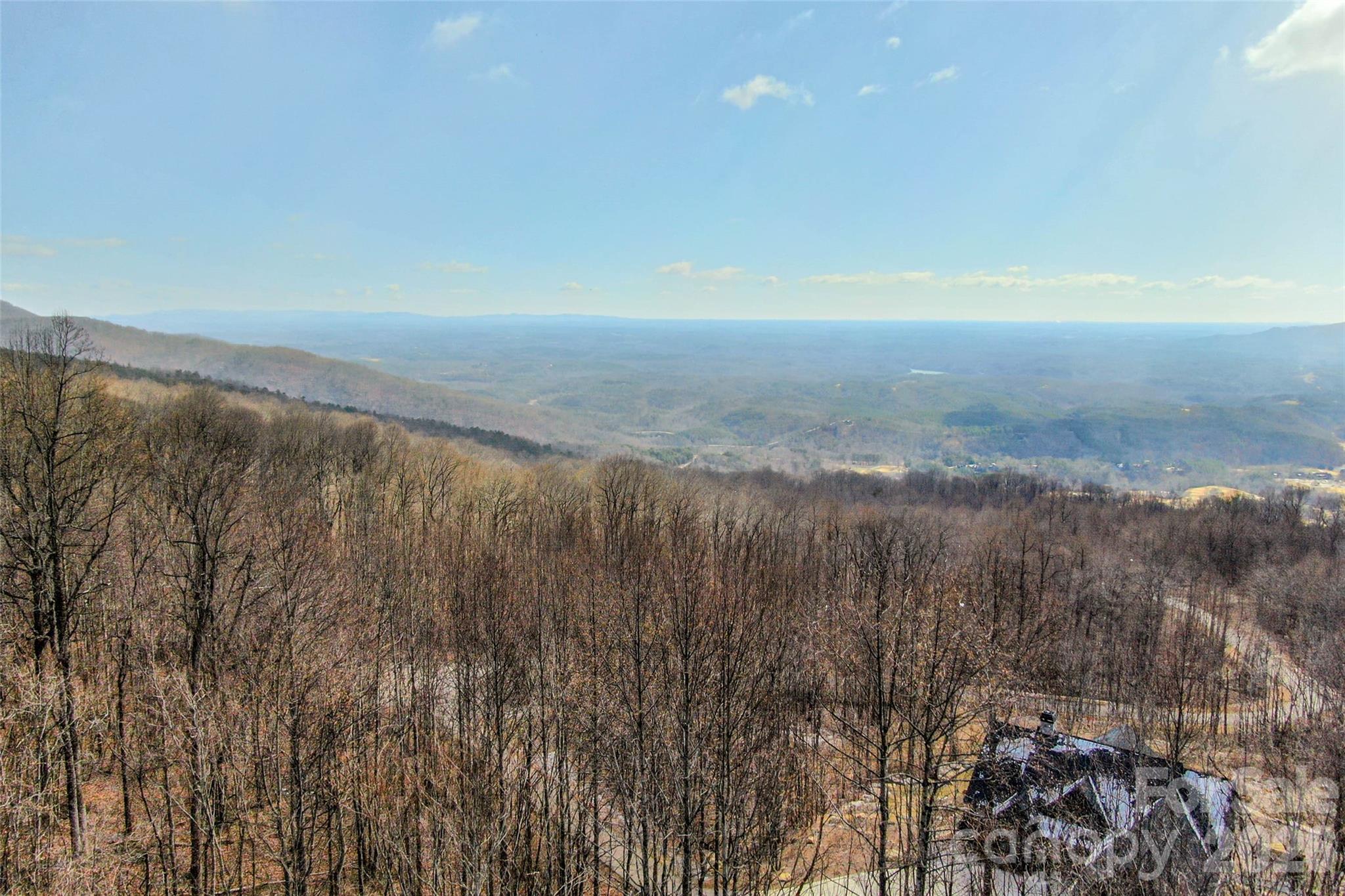 630 Spring Cove Ln Mill Spring Mill Spring, NC 28756 - Photo 6 of 39 a view of lake and mountain