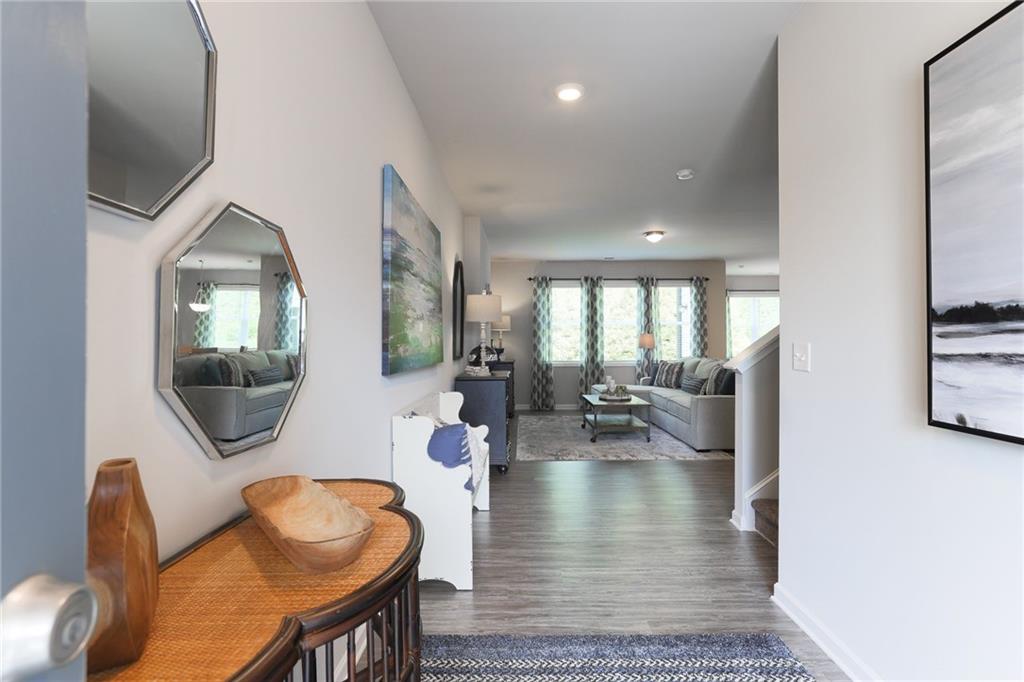 5126 Longview Run Decatur, GA 30035 - Photo 1 of 1 a living room with furniture and a wooden floor