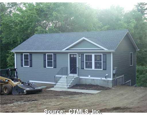 77-lot2 Shepard Hill Road Danielson, CT 06239 - Photo 1 of 1 a front view of a house with a yard and garage