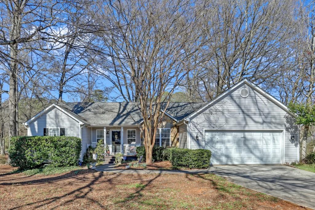 429 Red Oak Court Monroe, GA 30655 - Photo 1 of 40 a front view of a house with a yard