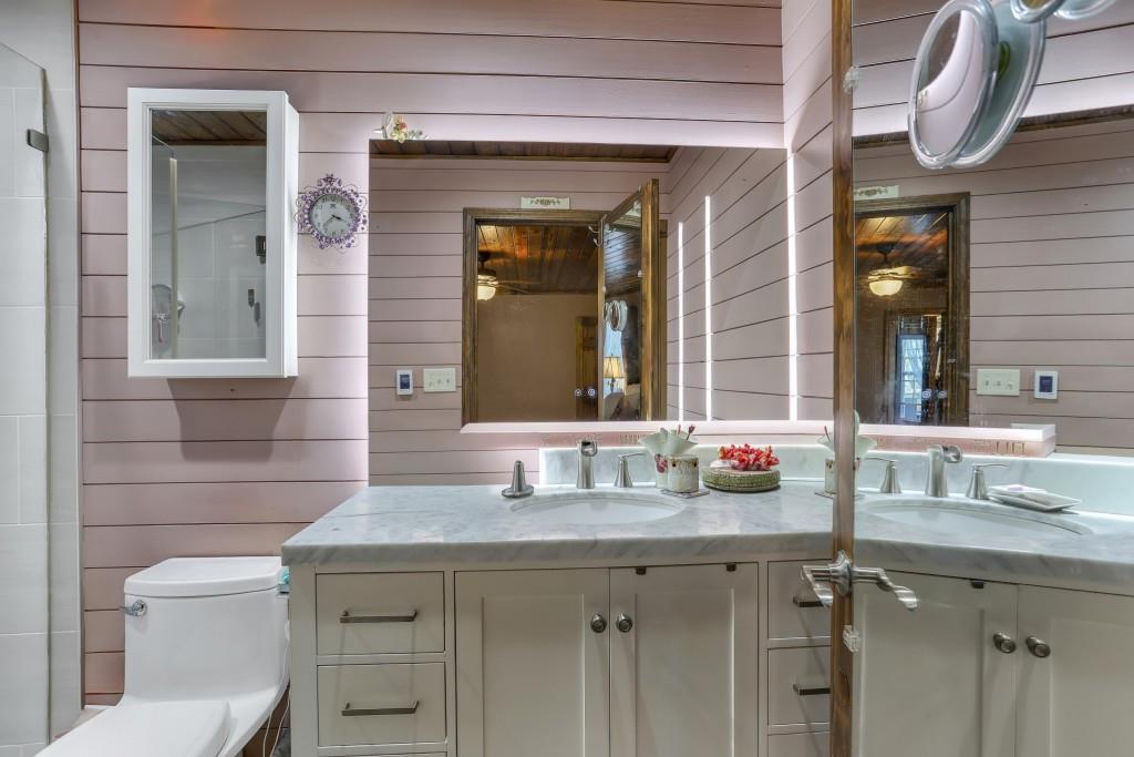 429 Red Oak Court Monroe, GA 30655 - Photo 18 of 40 a bathroom with a sink and a mirror
