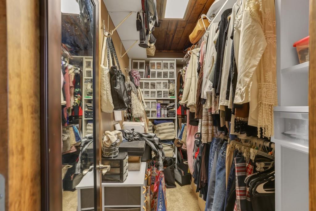 429 Red Oak Court Monroe, GA 30655 - Photo 20 of 40 a view of walk in closet with clothes