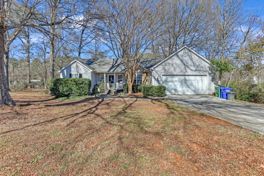 429 Red Oak Court Monroe, GA 30655 - Photo 2 of 40 a view of road with large trees