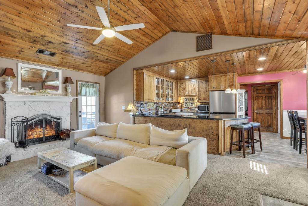 429 Red Oak Court Monroe, GA 30655 - Photo 3 of 40 a living room with furniture and a fireplace