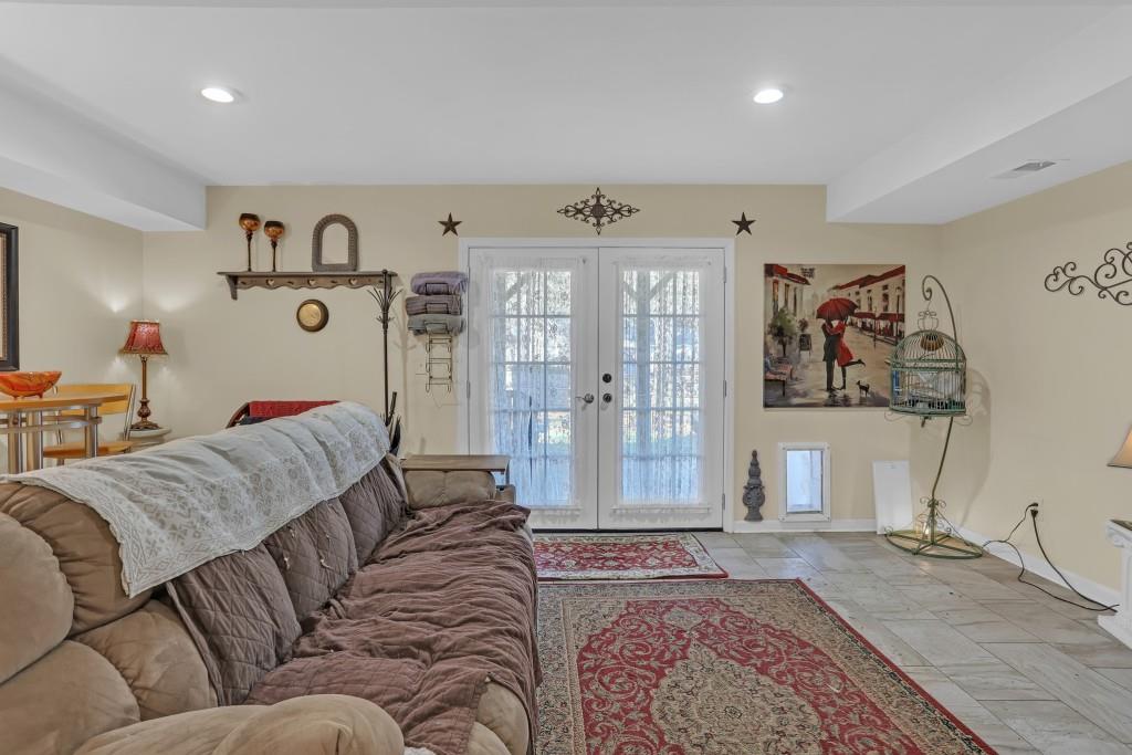 429 Red Oak Court Monroe, GA 30655 - Photo 33 of 40 a living room with furniture and large window