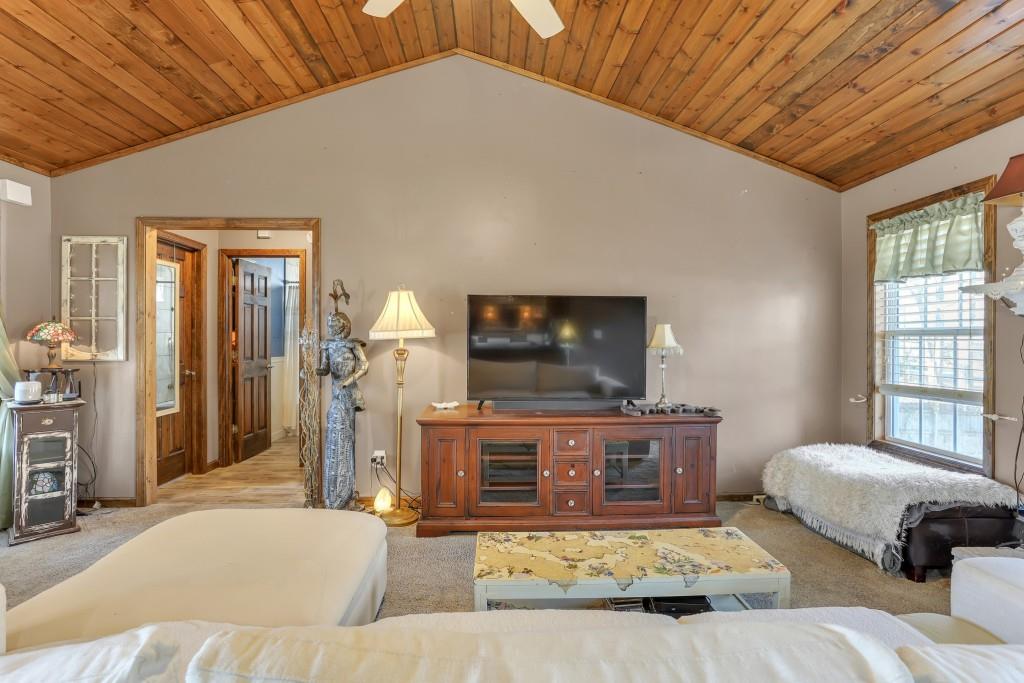 429 Red Oak Court Monroe, GA 30655 - Photo 6 of 40 a living room with furniture and a flat screen tv