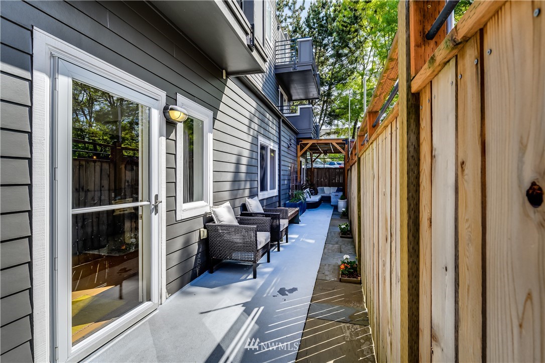 115 West Galer Street, Unit 101 Seattle, WA 98119 - Photo 18 of 23 a balcony view with a seating space