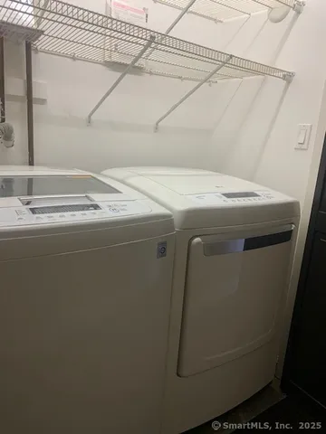 a swimming pool with outdoor seating and yard