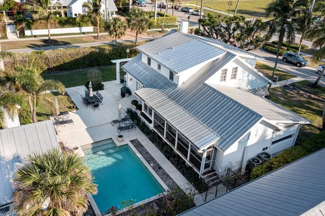an aerial view of a house with a garden