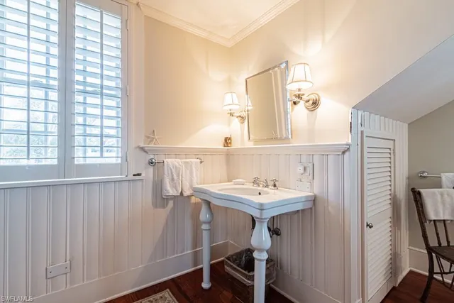 a view of a dining room with furniture and window