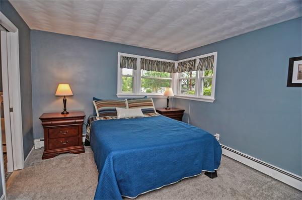 28 Lohnes Road Framingham, MA 01701 - Photo 9 of 14 a bedroom with a bed and a window
