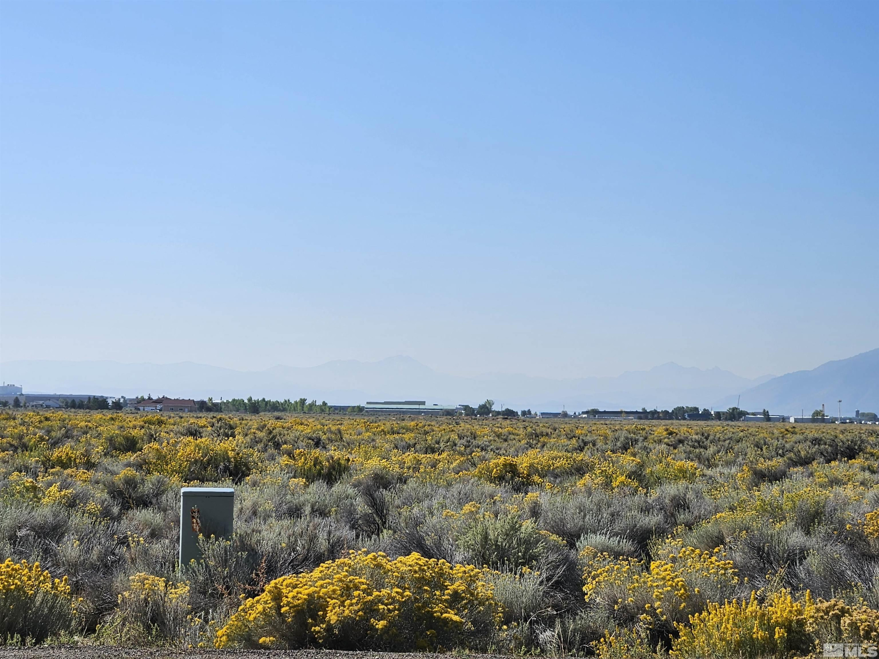 1205 Stephanie Way, Unit 57 Minden, NV 89423 - Photo 11 of 27 an aerial view of a house with a lake view
