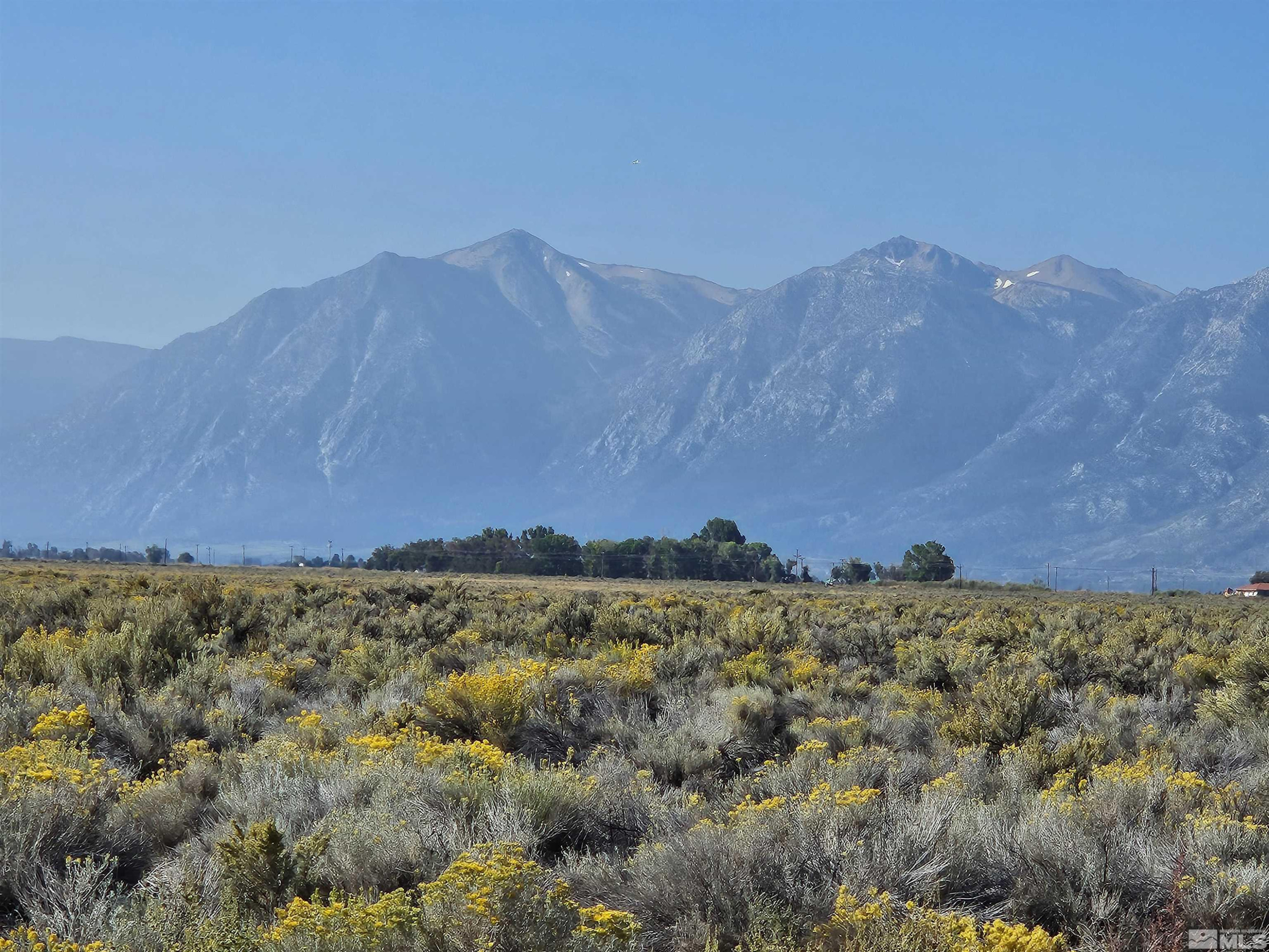 1205 Stephanie Way, Unit 57 Minden, NV 89423 - Photo 14 of 27 a view of a big building with mountain view