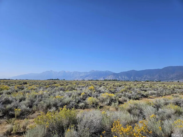 a view of an outdoor space and mountain view