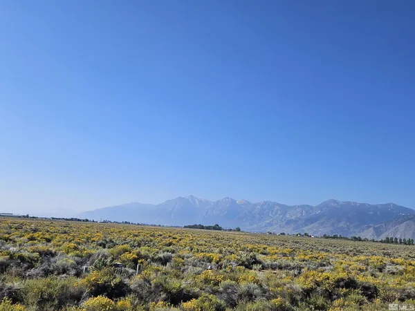 a view of mountains and valleys