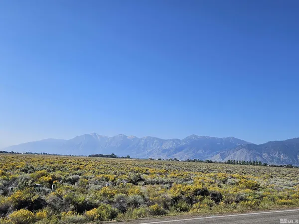 a view of an outdoor space and mountain view