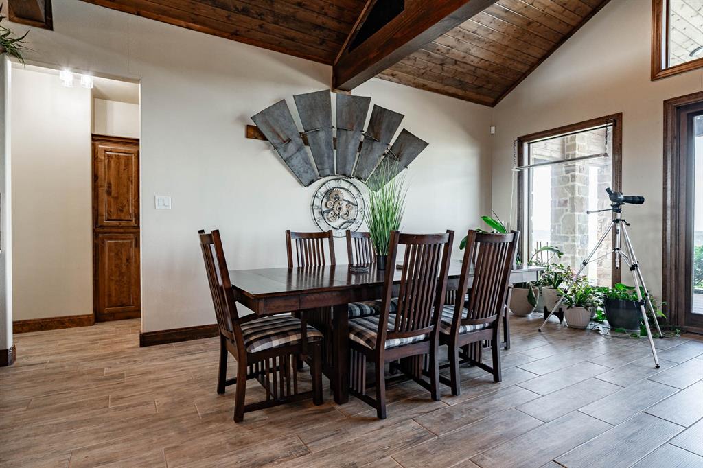 1032 Braune Road Merkel, TX 79536 - Photo 12 of 36 a view of a dining room with furniture window and wooden floor