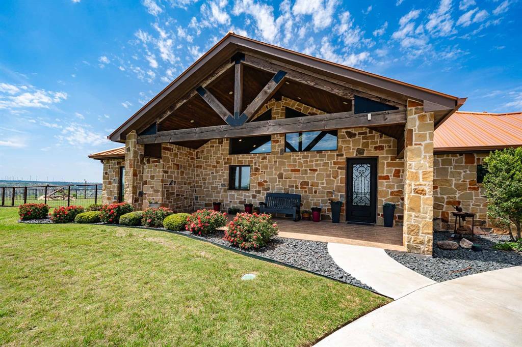 1032 Braune Road Merkel, TX 79536 - Photo 2 of 36 a front view of a house with garden