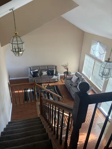 a view of a balcony with furniture