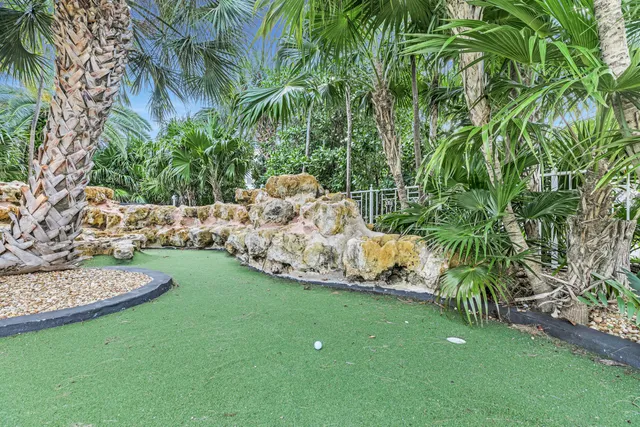 a view of a backyard with a patio