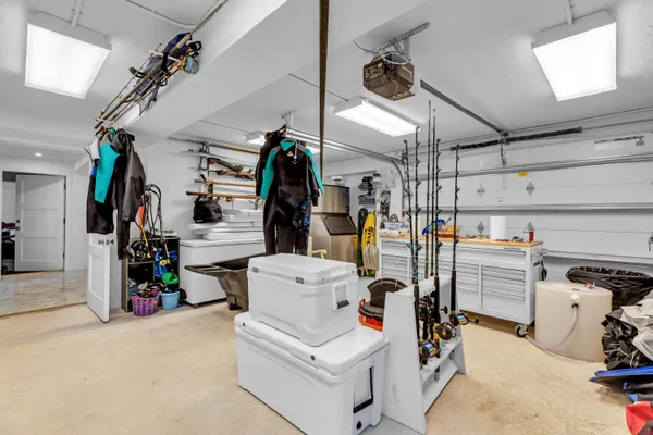 a bed room with a bed and a large window