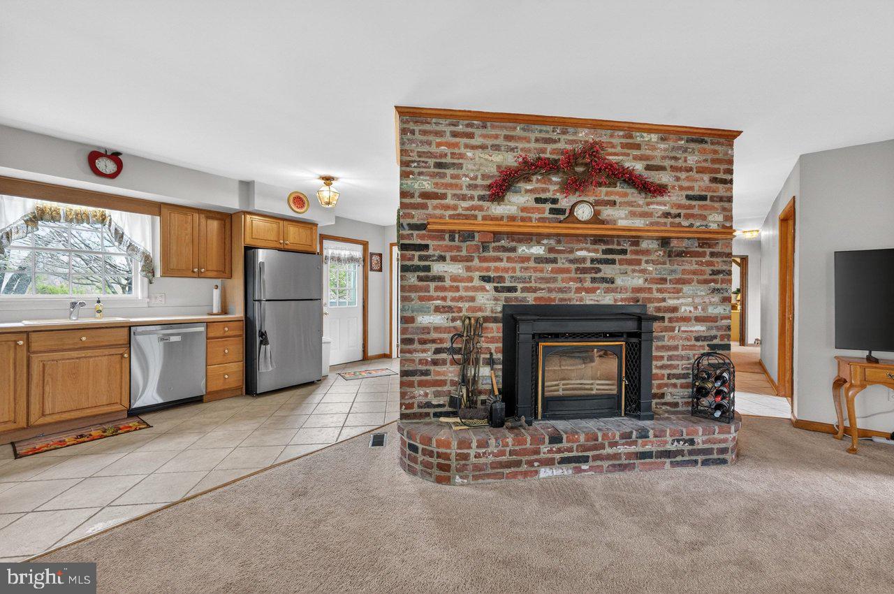 158 Chesterfield Georgetown Road Chesterfield, NJ 08515 - Photo 11 of 48 Cozy wood burning brick fireplace.