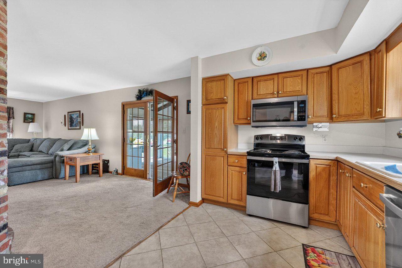 158 Chesterfield Georgetown Road Chesterfield, NJ 08515 - Photo 12 of 48 Inviting kitchen with warm wood tones.