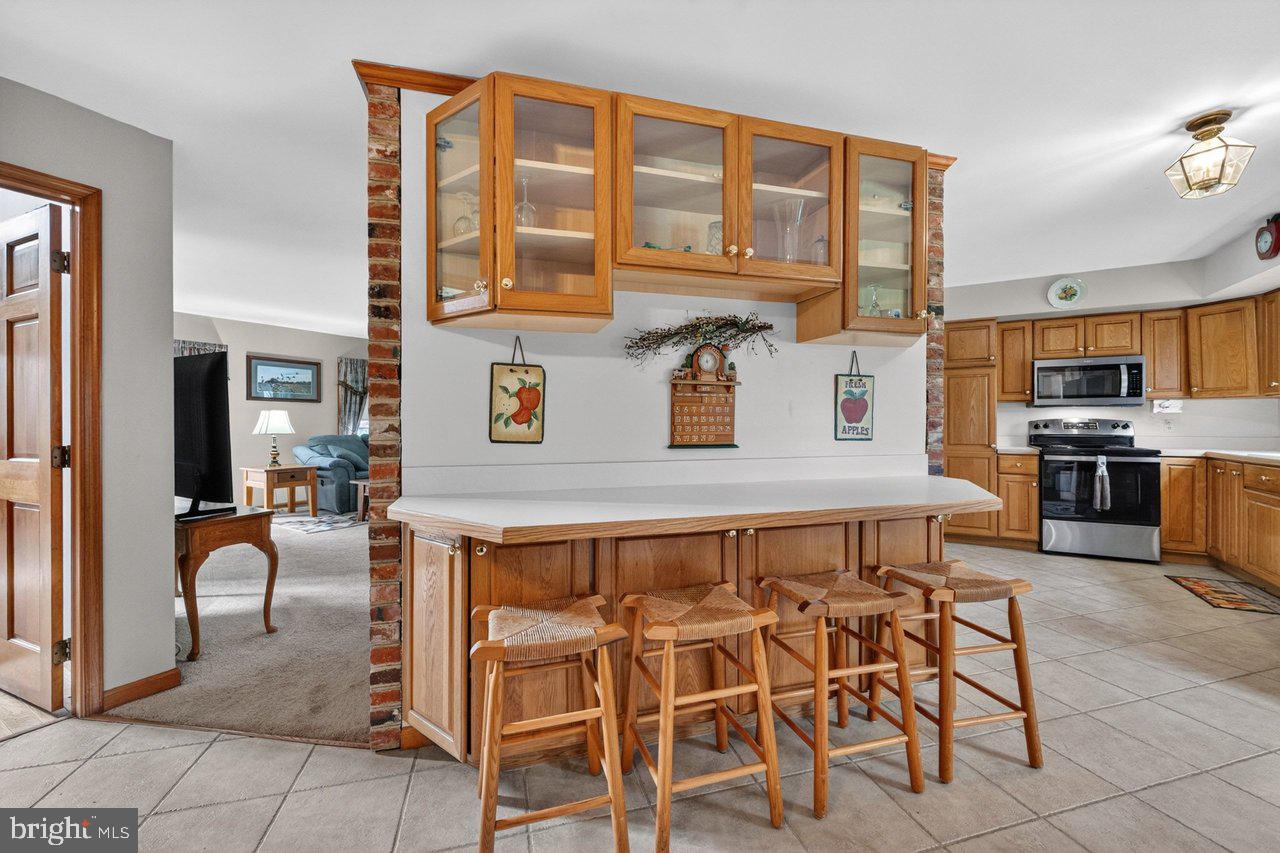 158 Chesterfield Georgetown Road Chesterfield, NJ 08515 - Photo 15 of 48 Inviting kitchen with warm wood accents.