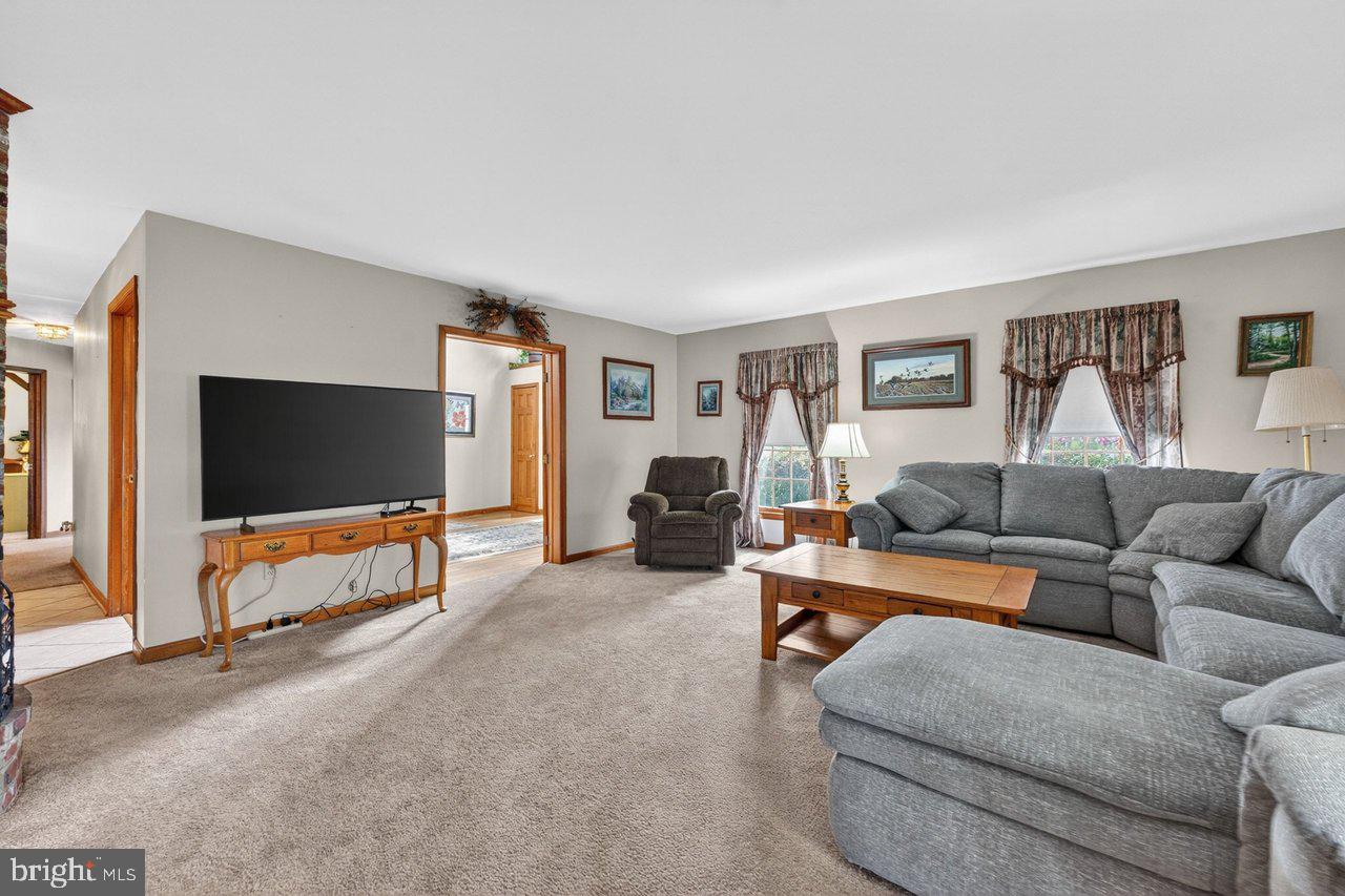 158 Chesterfield Georgetown Road Chesterfield, NJ 08515 - Photo 9 of 48 Spacious living area with cozy charm.
