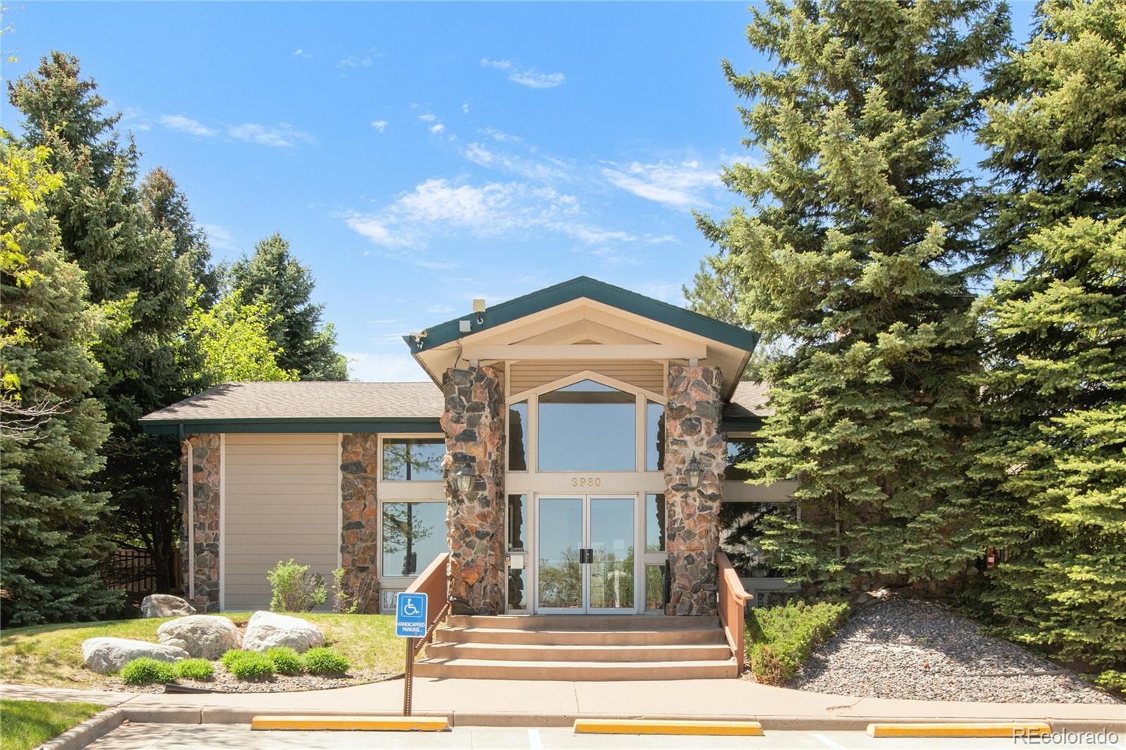 8405 Pebble Creek Way, Unit 202 Highlands Ranch, CO 80126 - Photo 25 of 27 front view of a house