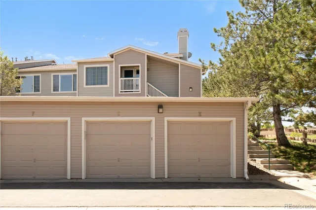 a black and white house with a outdoor space