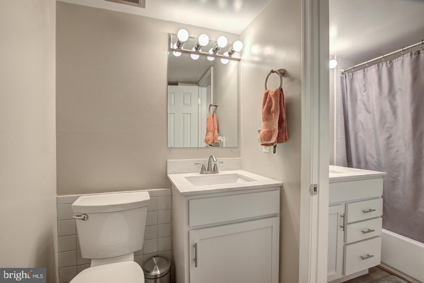 8354 G Dunham Court, Unit 655 Springfield, VA 22152 - Photo 15 of 19 a bathroom with a toilet sink and shower