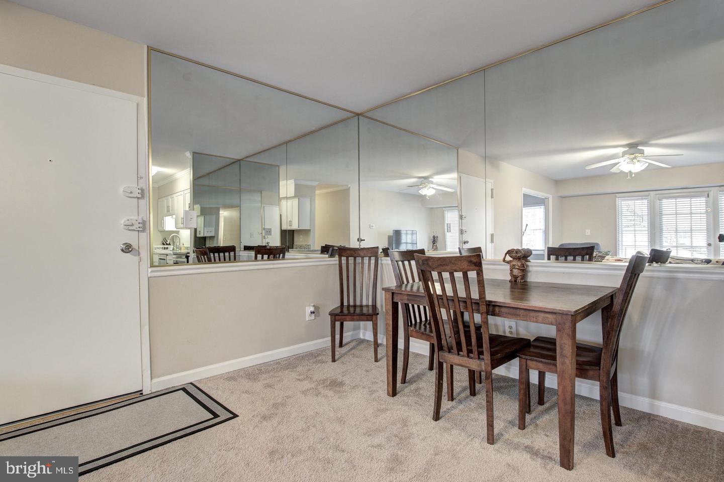 8354 G Dunham Court, Unit 655 Springfield, VA 22152 - Photo 7 of 19 a view of a dining room with furniture