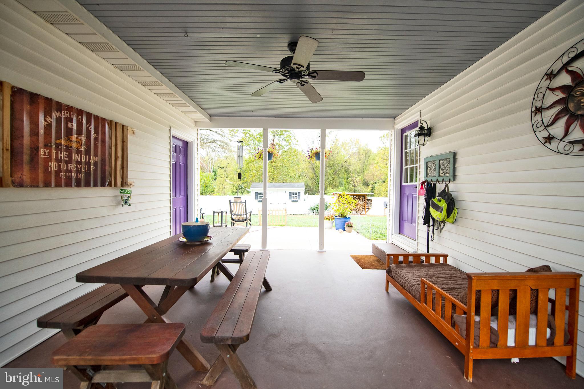749 Conowingo Road Conowingo, MD 21918 - Photo 28 of 44 Covered Breezeway from Kitchen Leads to Patio-Yard